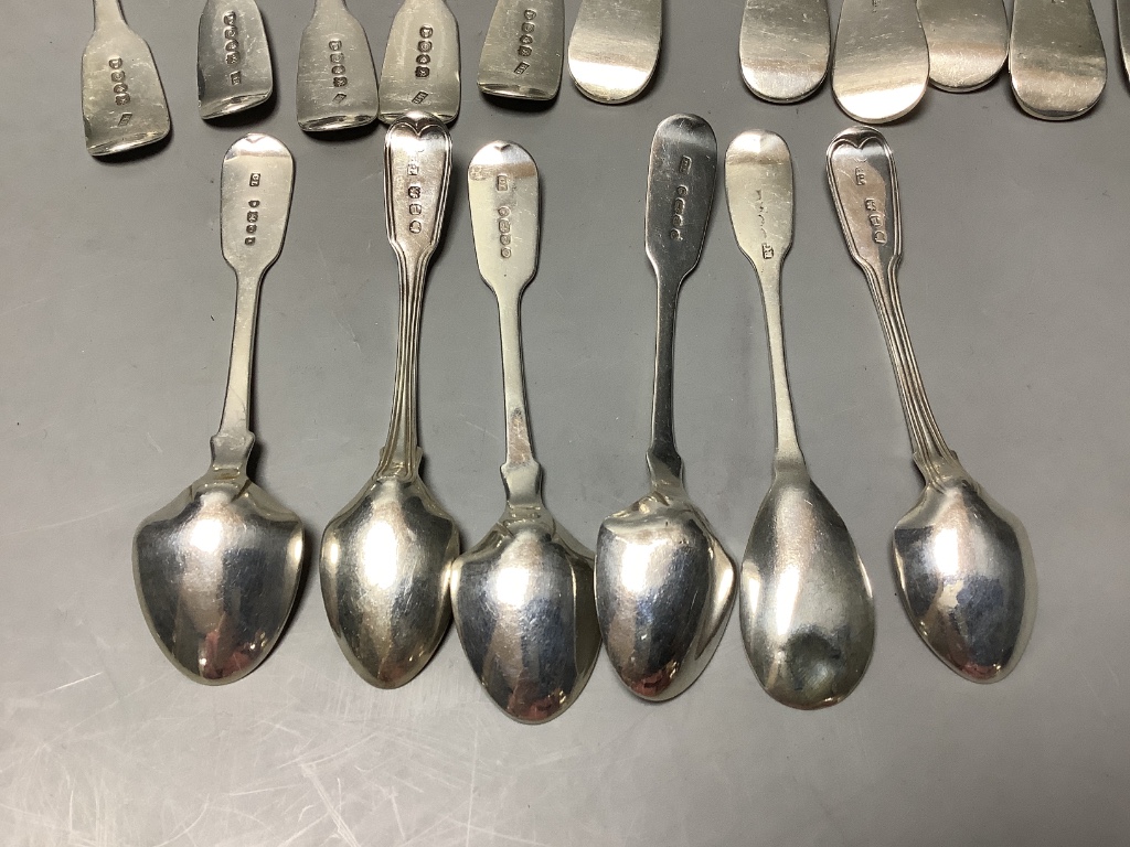 A set of six George III silver fiddle pattern dessert spoons and a small quantity of mixed fiddle pattern flatware, approximately 19oz